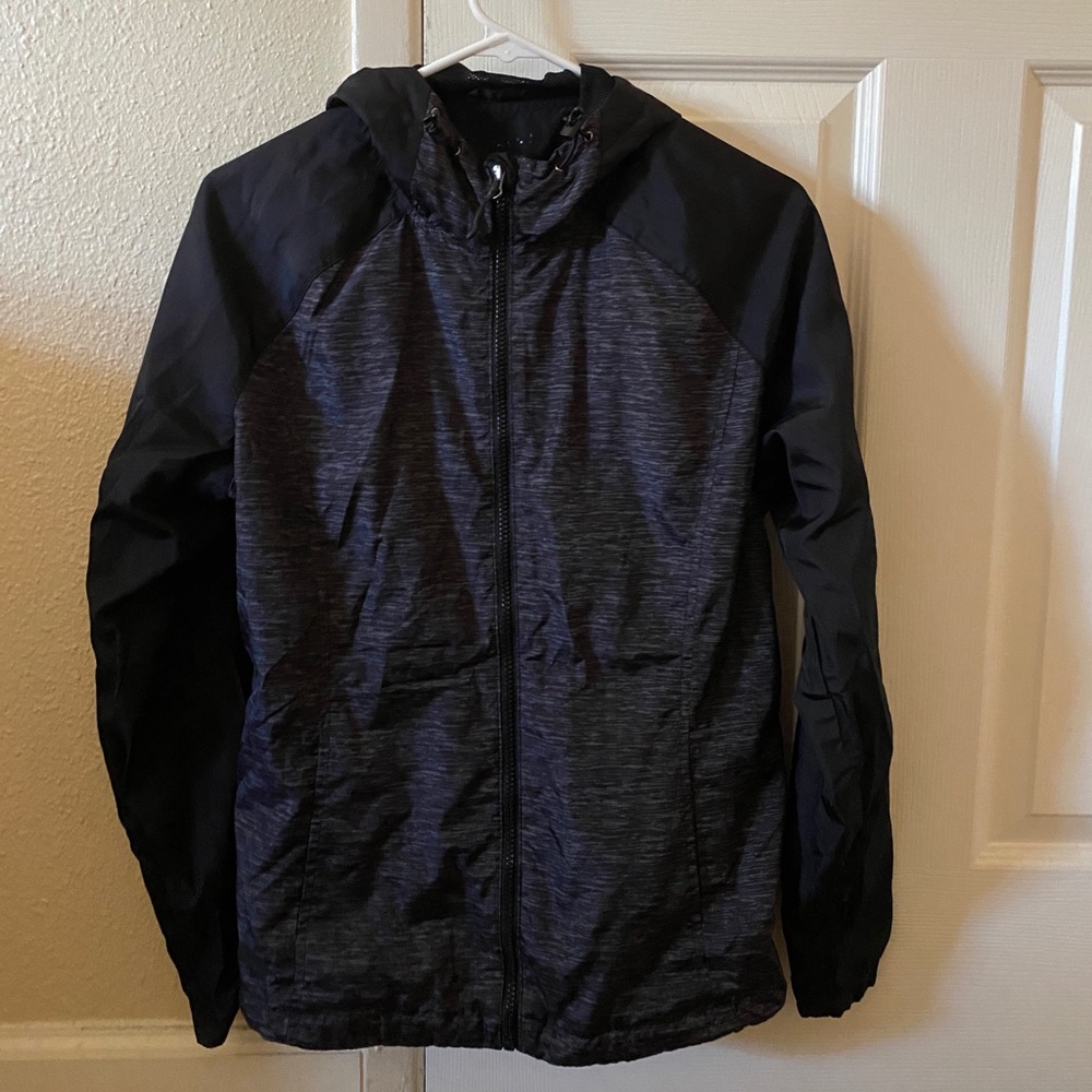 Black and grey windbreaker